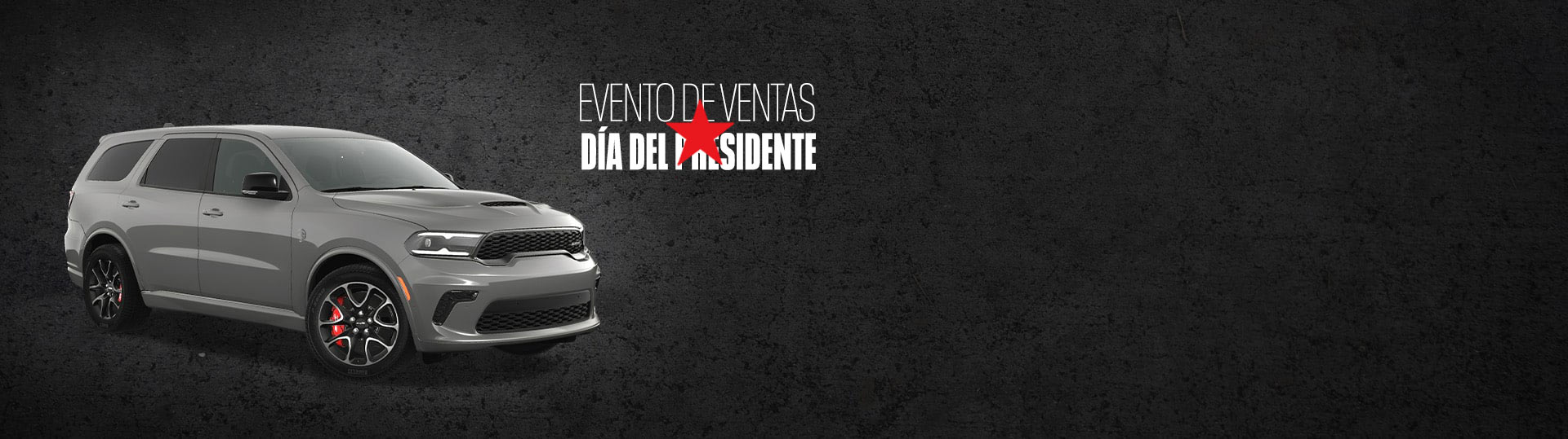 Ángulo delantero del lado del pasajero de un Dodge Durango SRT Hellcat 2024 gris. Evento de ventas Día del Presidente.