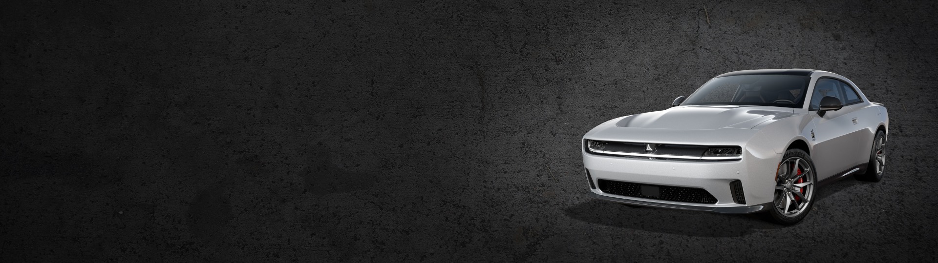 Un Dodge Charger Daytona Scat Pack 2024 en Triple Nickel. Evento de ventas del Día del Presidente.