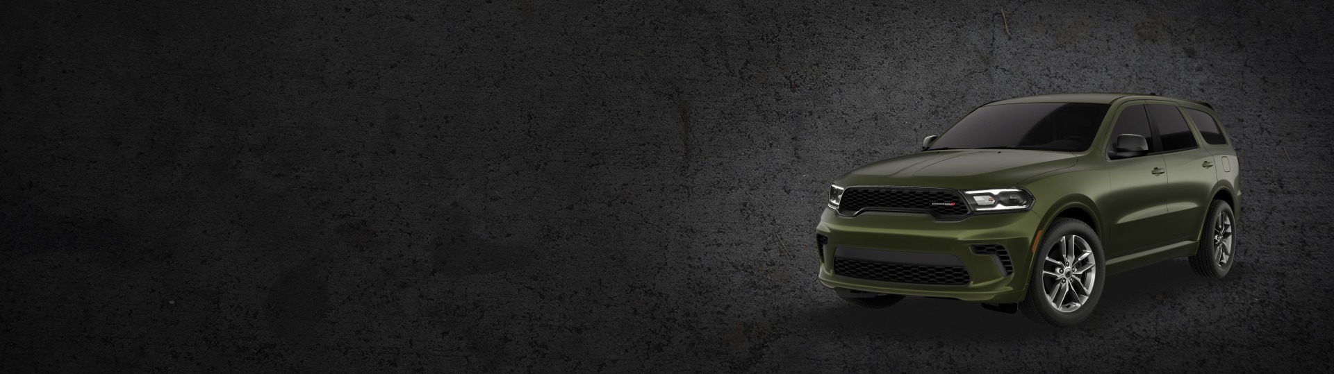 Un Durango GT Plus 2026 en color verde. Evento de ventas del Día del Presidente.