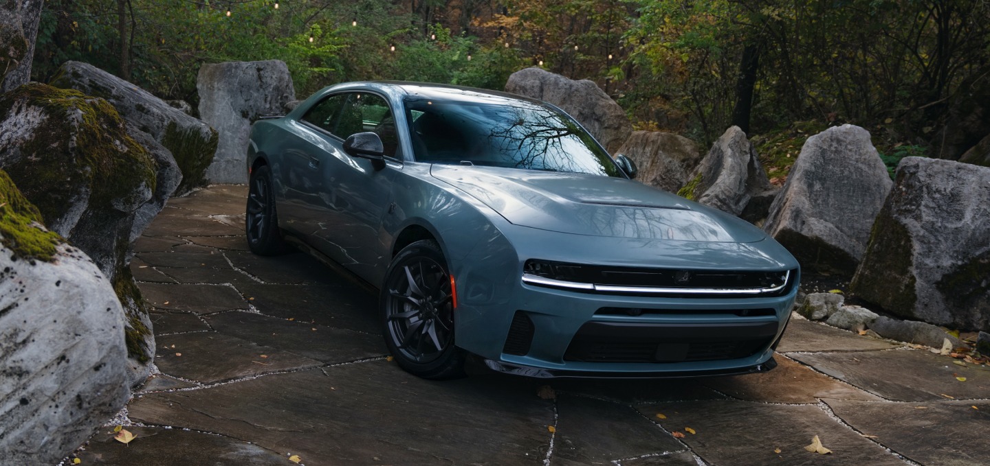 A blue 2027 Dodge Charger Scat Pack.