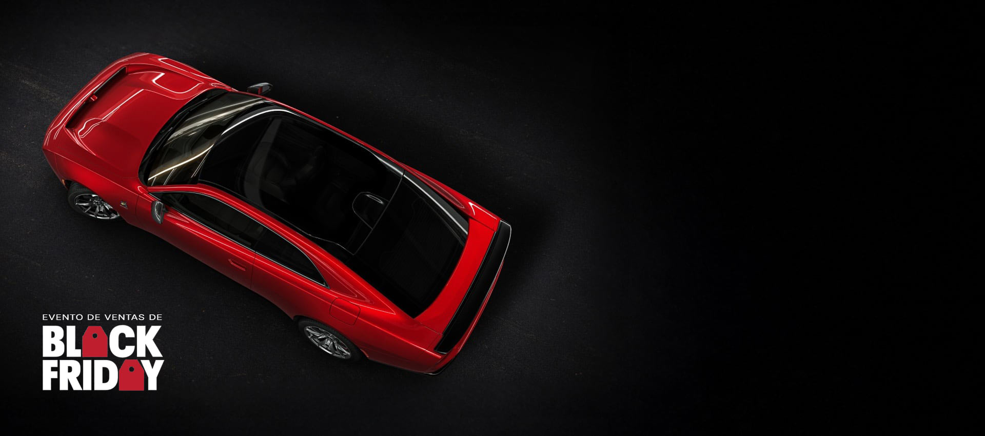 Ángulo superior de un Dodge Charger Scat Pack 2024 rojo de última generación en el que se destaca el techo corredizo de vidrio panorámico. Evento de ventas Black Friday.